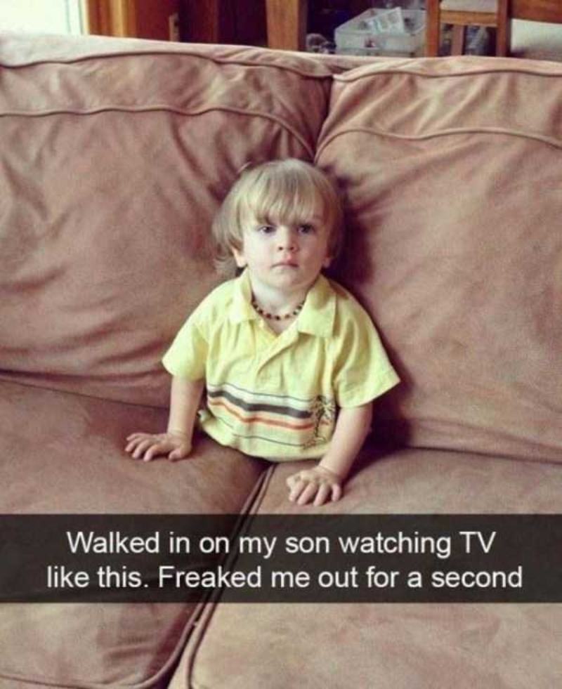 Funny kid watching tv