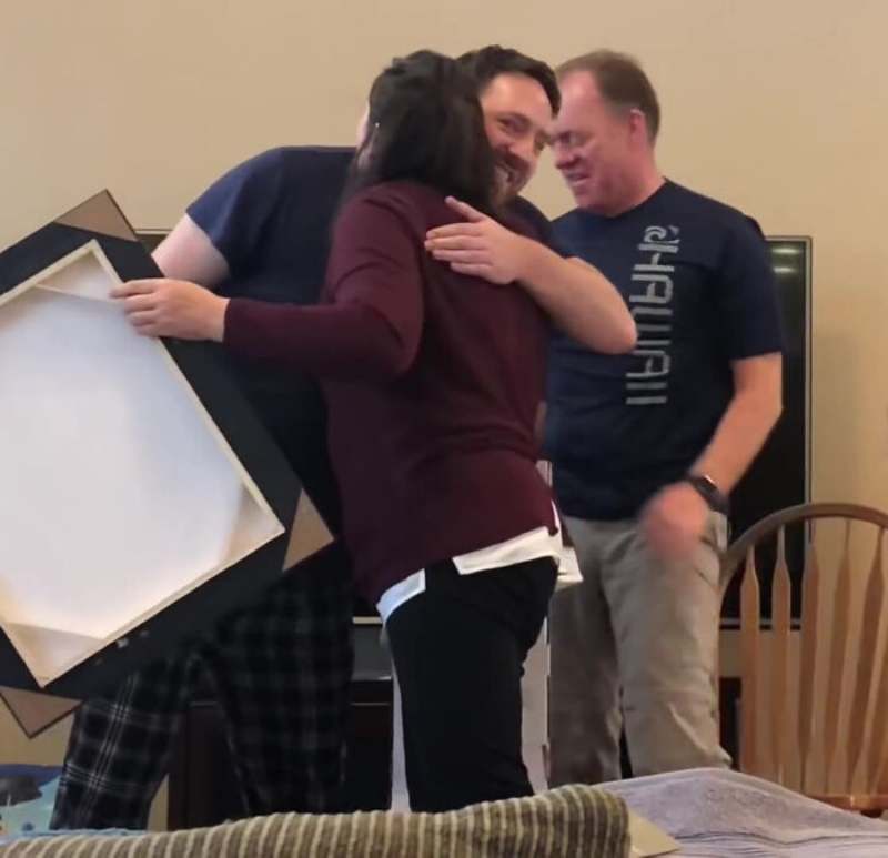 parents hugging - jesus prank