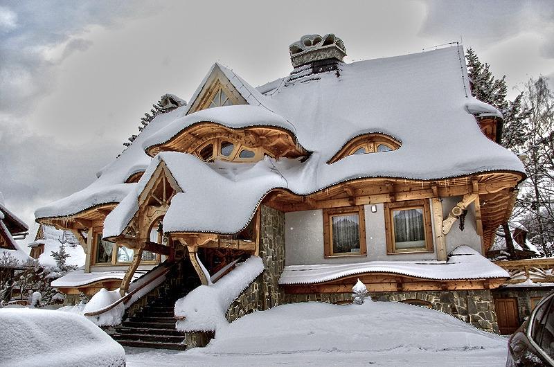 snow covered cottage