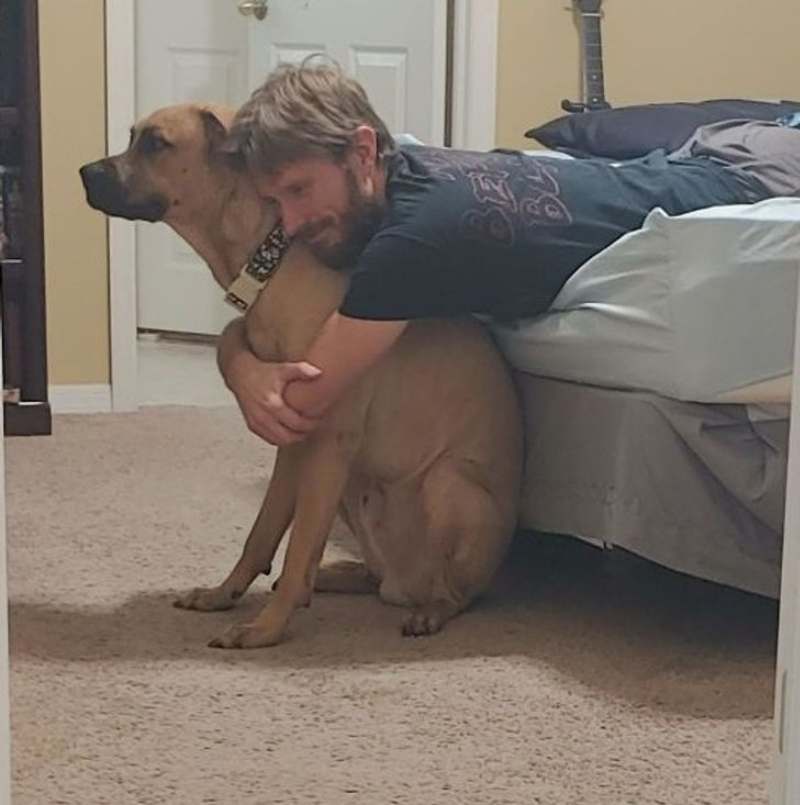 hugging a dog