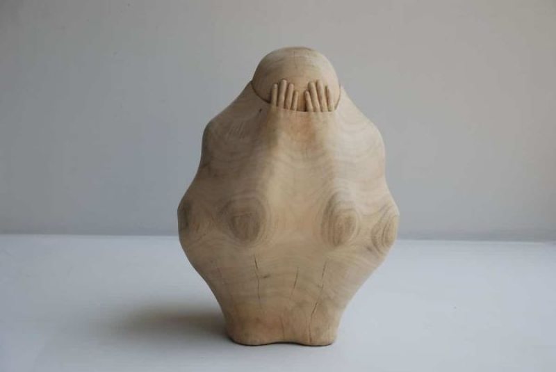 These Wood Sculptures Are Carved To Make It Look Like Someone Is Trapped