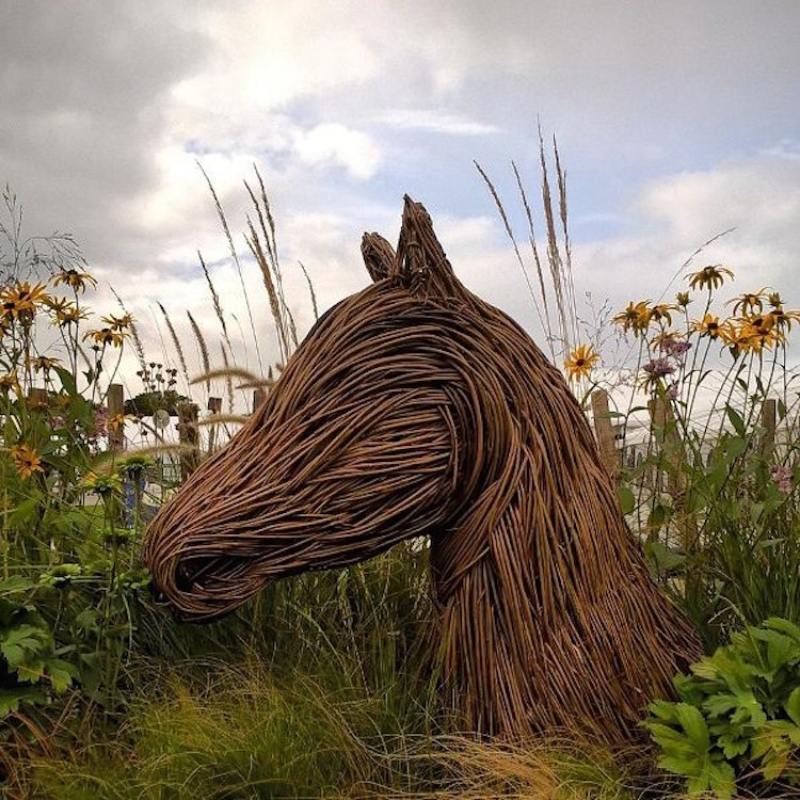 woven rods horse head in UK forest