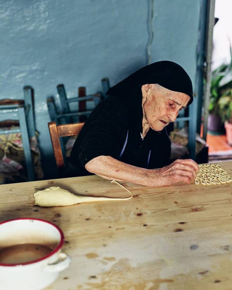 old granny making pasta