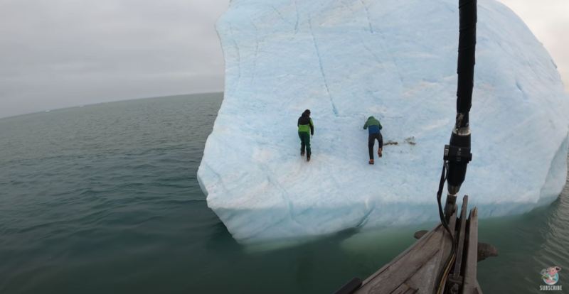 Watch: Iceberg Flips Upside Down Throwing Explorers Into Arctic Waters