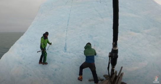 Watch: Iceberg Flips Upside Down Throwing Explorers Into Arctic Waters